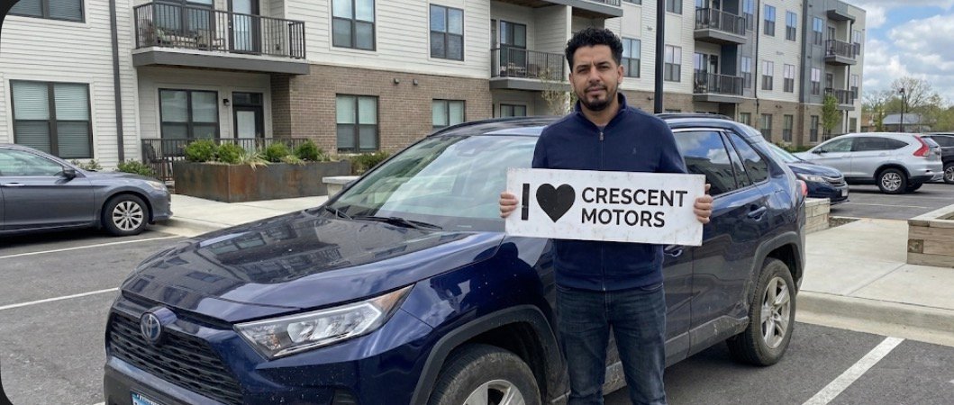 Satisfied seller with Toyota RAV4 at Crescent Motors Richardson